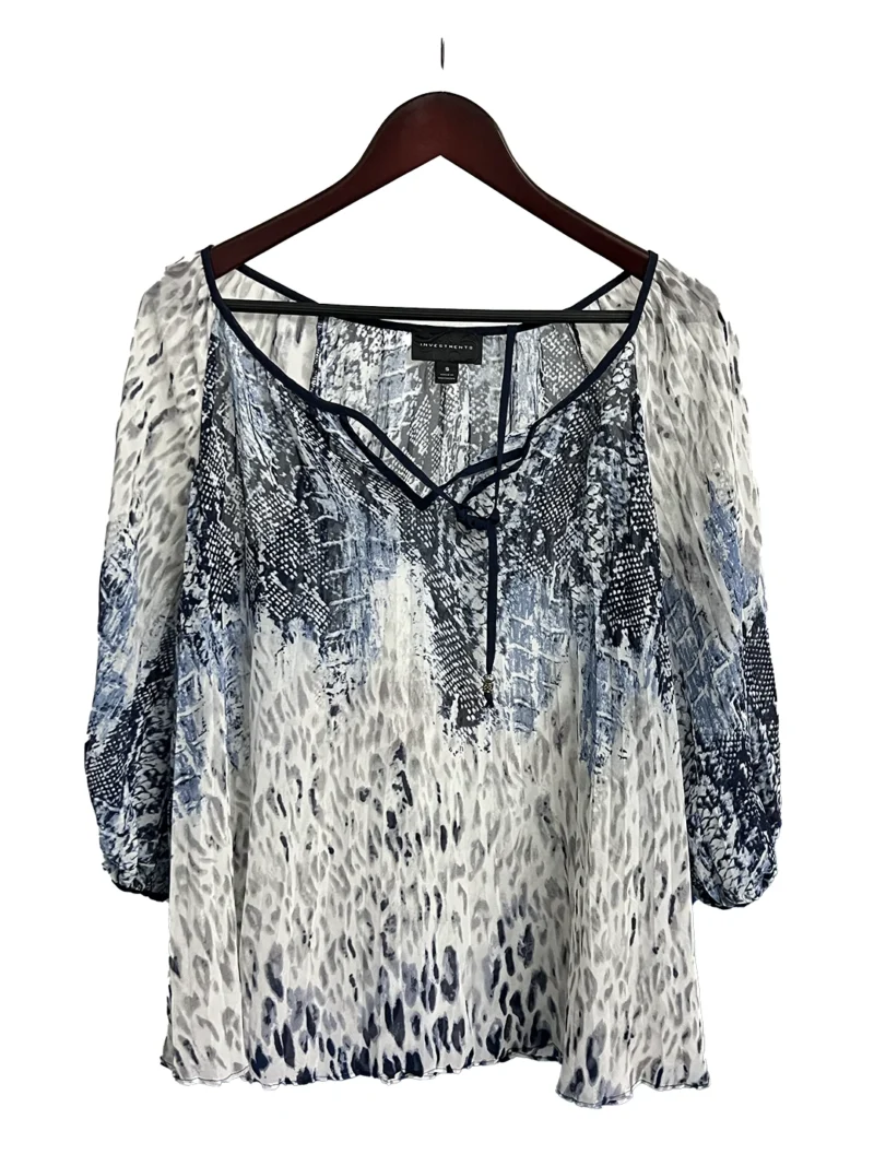 Blusa Blanca con Azul Investments