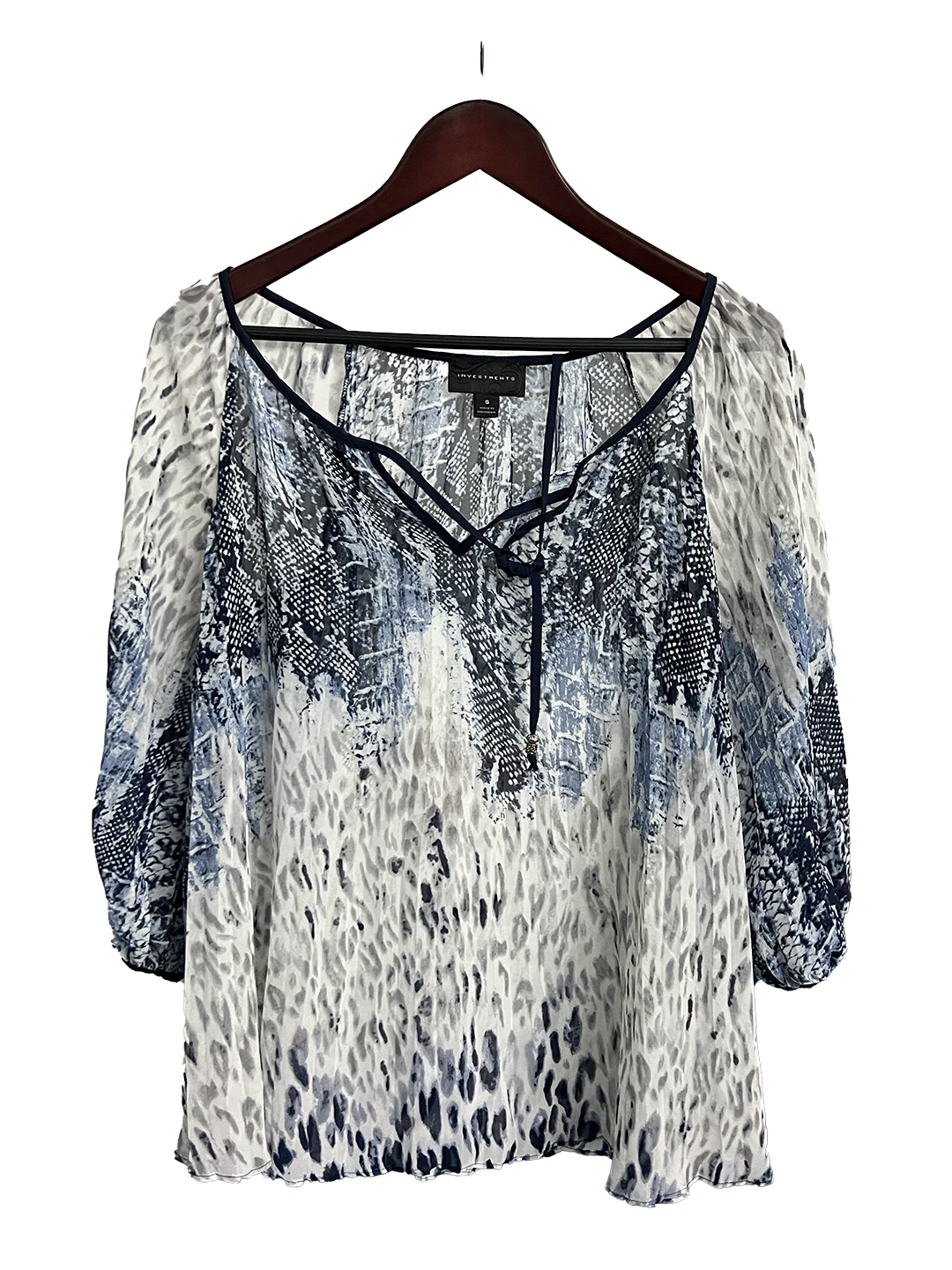 Blusa Blanca con Azul Investments