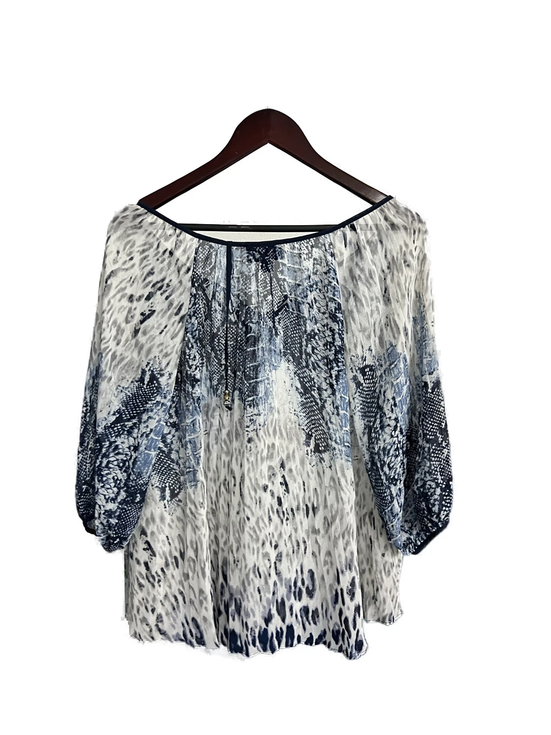 Blusa Blanca con Azul Investments